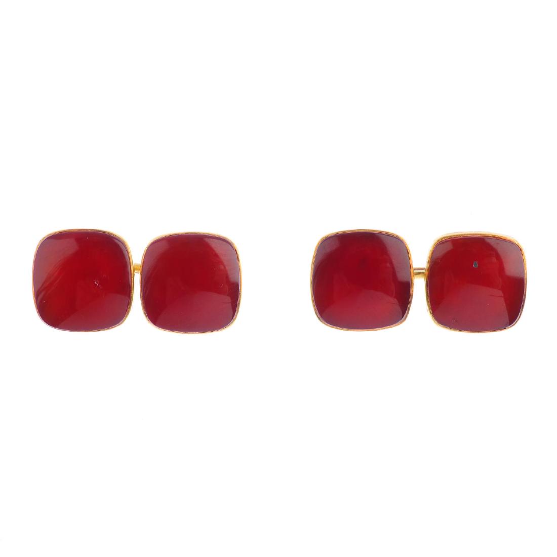 A pair of carnelian cufflinks. Each designed as two (1 of 2)