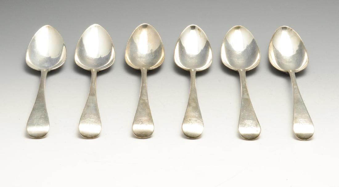 A pair of George III silver tablespoons, of Old English: A pair of George III silver tablespoons, of Old English pattern with crested terminal, hallmarked Christopher & Thomas Wilkes Barker, London 1801, length measuring 8 3/8 inches (21.5 cm). Together wit