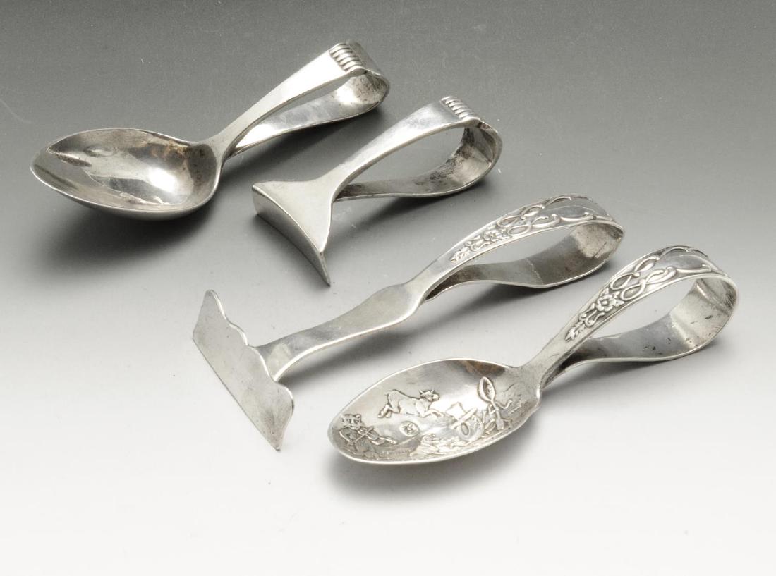 A selection of flatware and cutlery to include an: A selection of flatware and cutlery to include an Edwardian silver pusher and spoon, of typical form with scroll enclosed vacant cartouche to the terminals, the spoon bowl depicting the nursery rhyme 