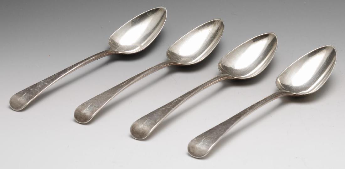 A set of four George III silver tablespoons, each of: A set of four George III silver tablespoons, each of Old English pattern with crested terminal, hallmarked Christopher & Thomas Wilkes Barke, London 1800, length measuring 8 7/8 inches (22.7 cm). Toge