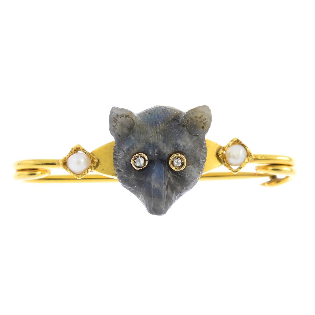 An early 20th century gem-set fox brooch. The carved (1 of 2)