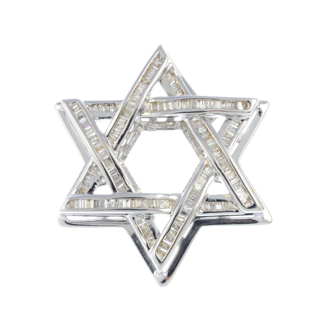 A 14ct gold diamond pendant. Designed as a Star of (1 of 2)