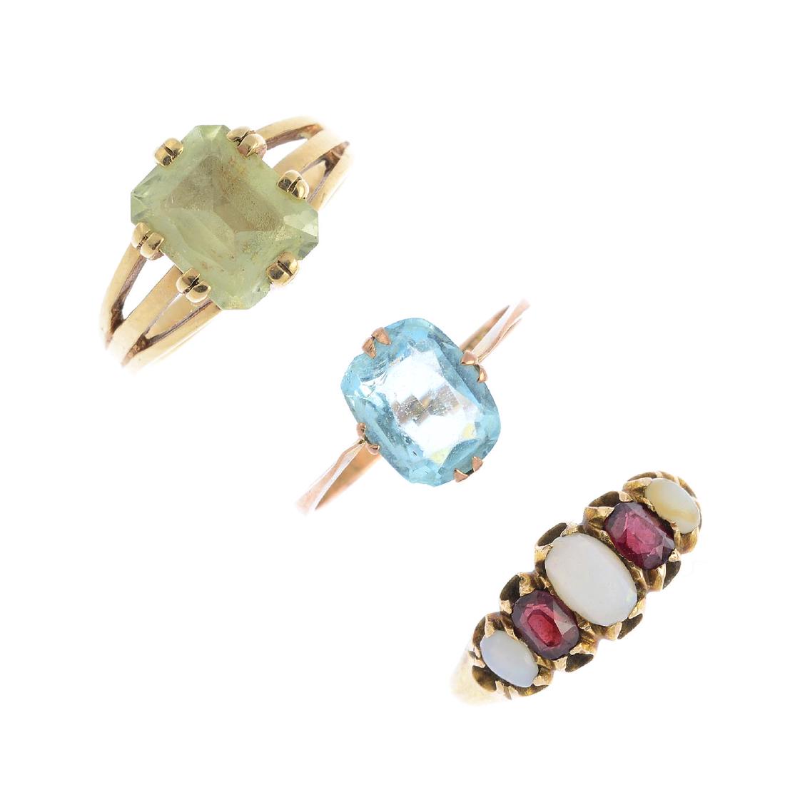 Four gem-set rings. To include an early 20th century (1 of 4)