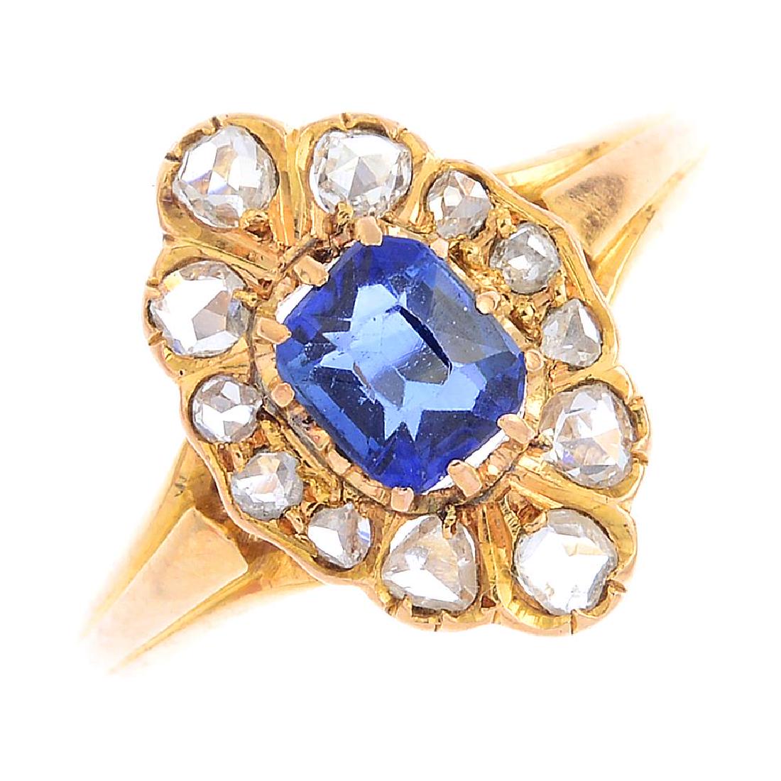 A sapphire and diamond cluster ring. Of marquise-shape (1 of 3)