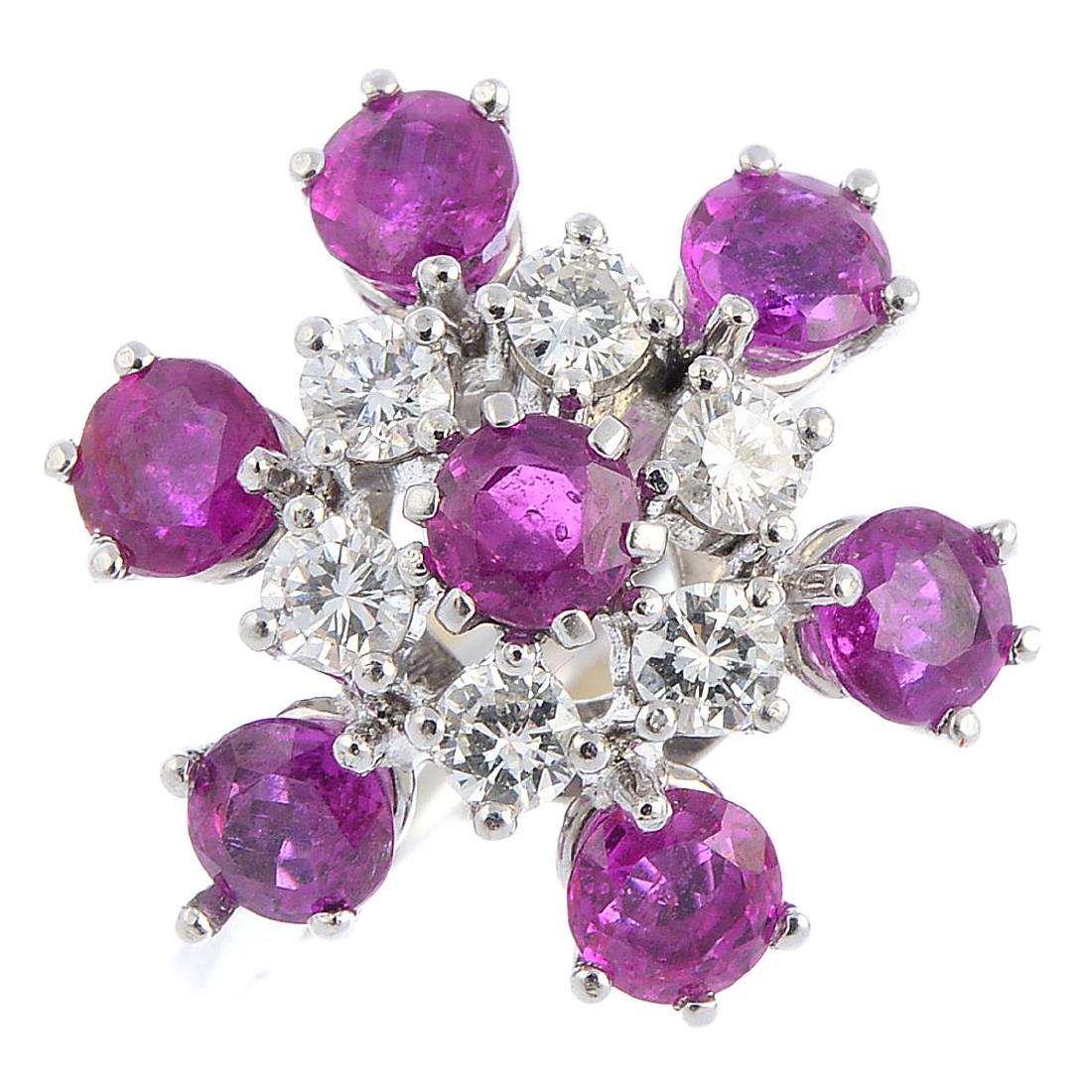 A ruby and diamond floral cluster ring. The (1 of 3)