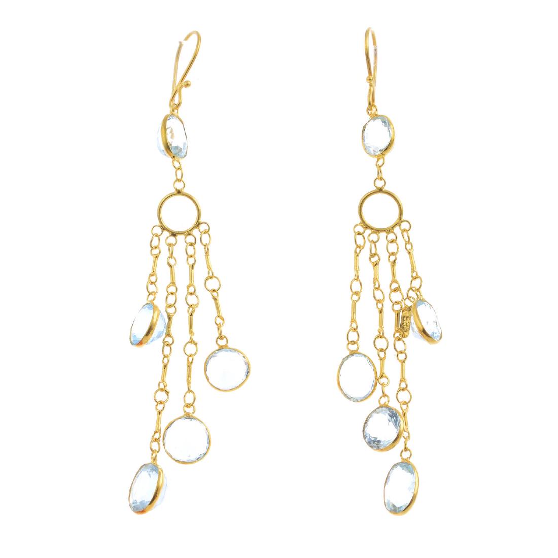 A pair of aquamarine earrings. Each designed as an (1 of 2)