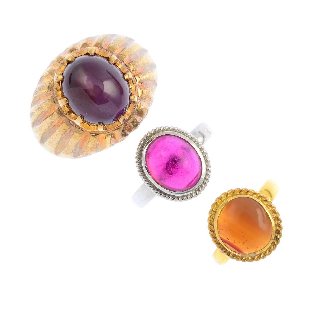 Three gem-set rings. To include a star ruby dress ring, (1 of 3)