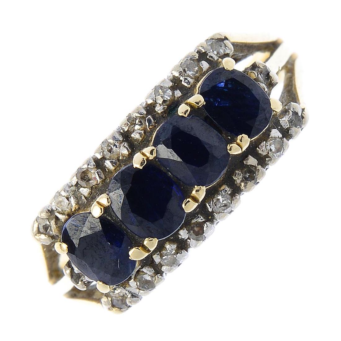 A sapphire and diamond ring. The oval-shape sapphire (1 of 3)