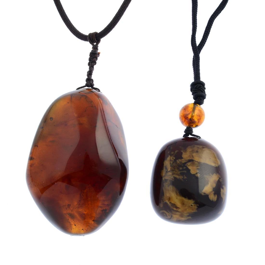 Two natural amber pendants. To include a natural root (1 of 2)