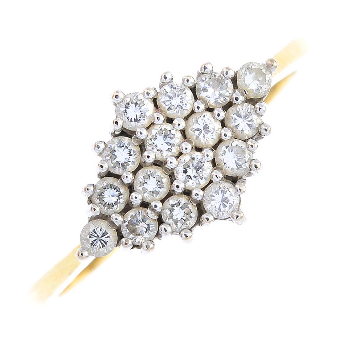 An 18ct gold diamond cluster ring. Designed as a (1 of 3)