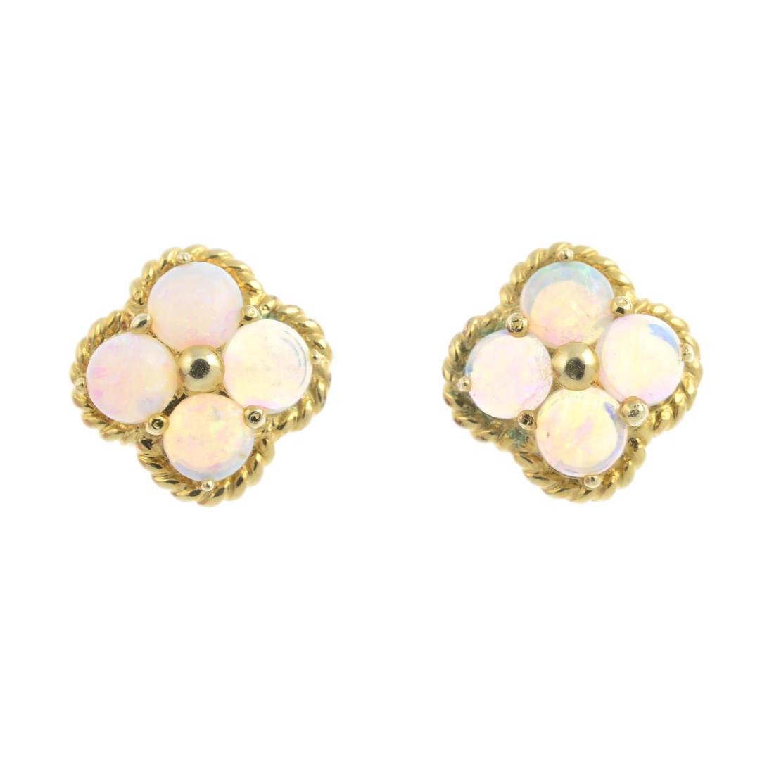 A pair of opal cluster earrings. Each designed as a (1 of 2)