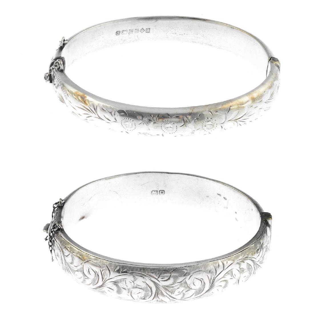 Seven bangles. To include five late Victorian silver (1 of 2)