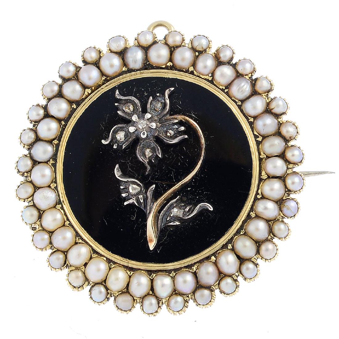 A mid Victorian gold diamond and split pearl mourning (1 of 2)