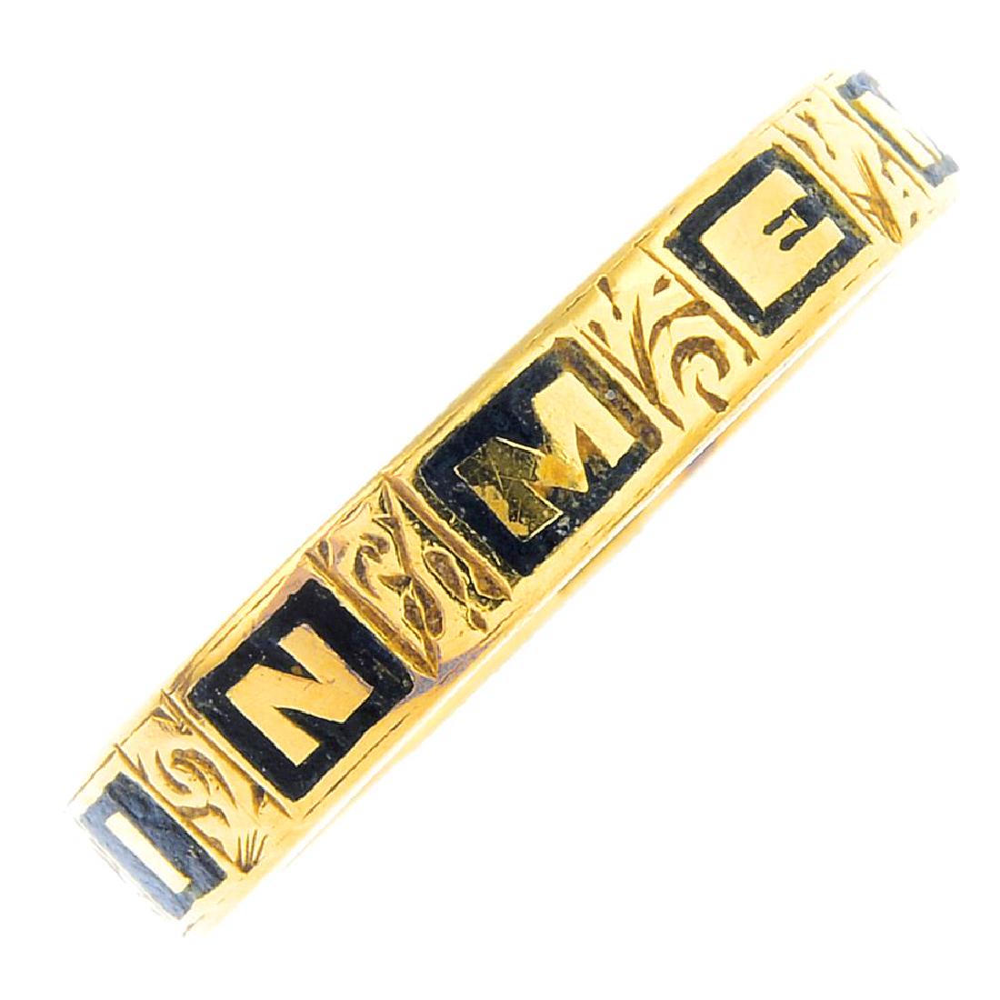 A mid Victorian gold and enamel memorial ring. Designed (1 of 3)
