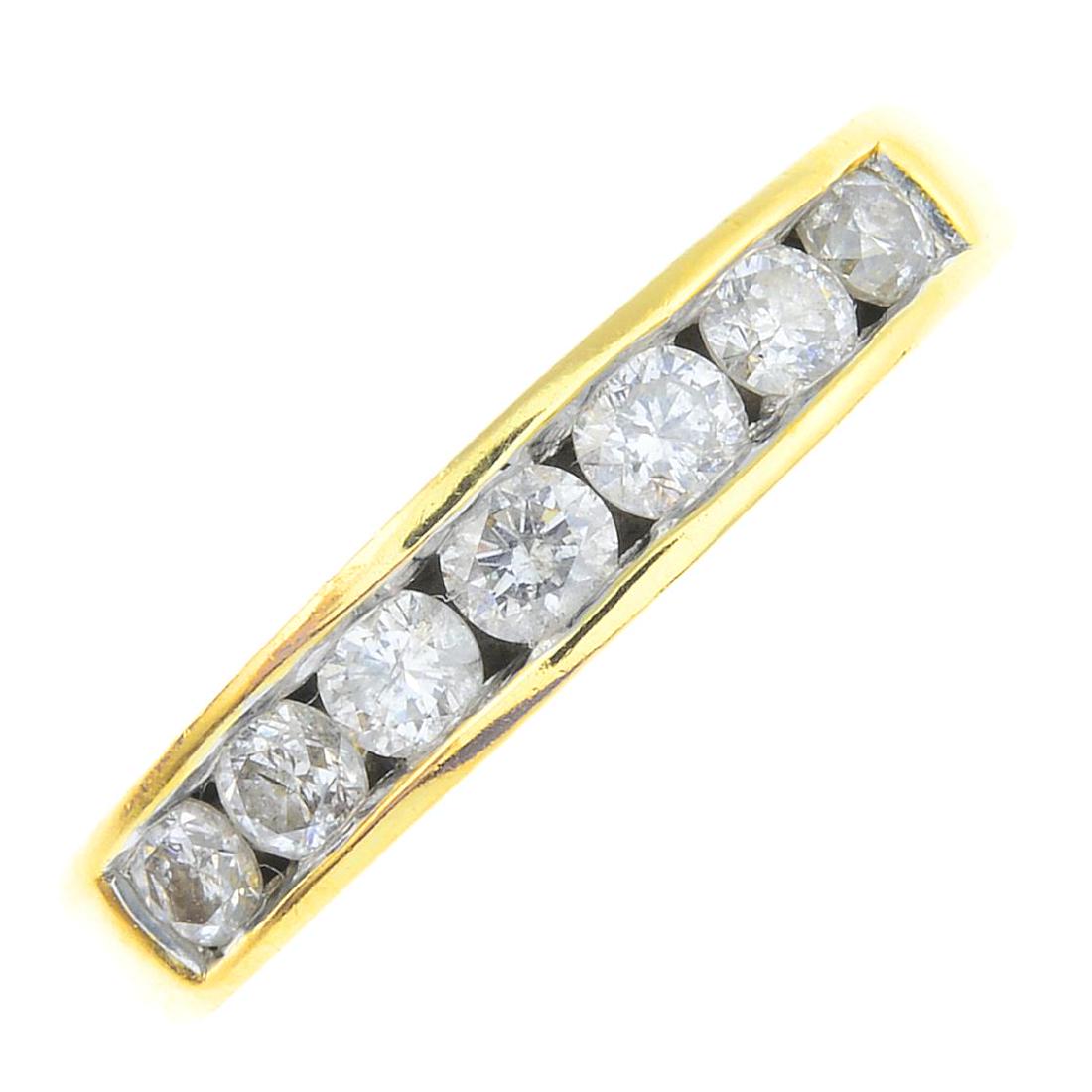An 18ct gold diamond half eternity ring. Designed as a (1 of 3)