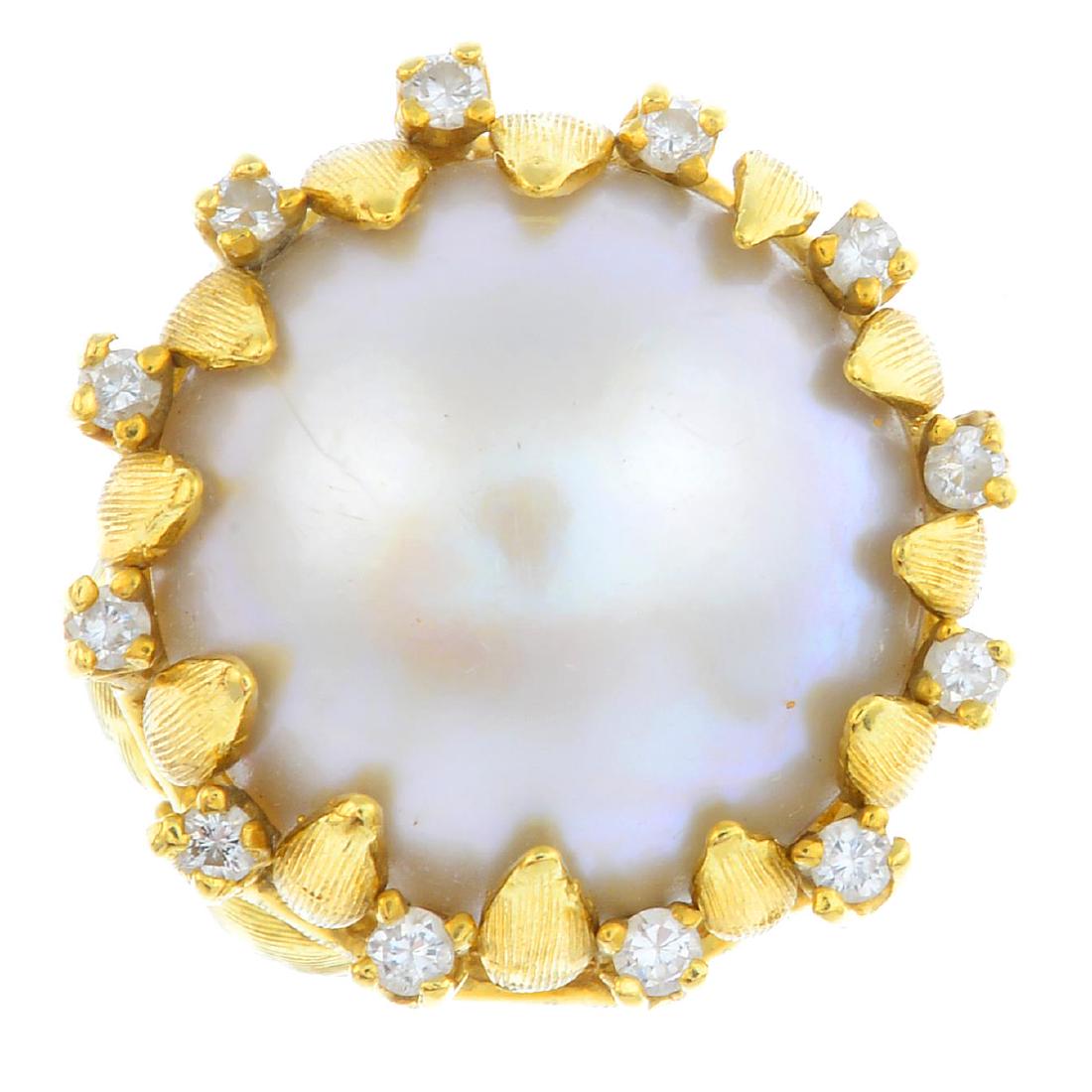 A 1970s mabe pearl and diamond ring. The mabe pearl, (1 of 3)