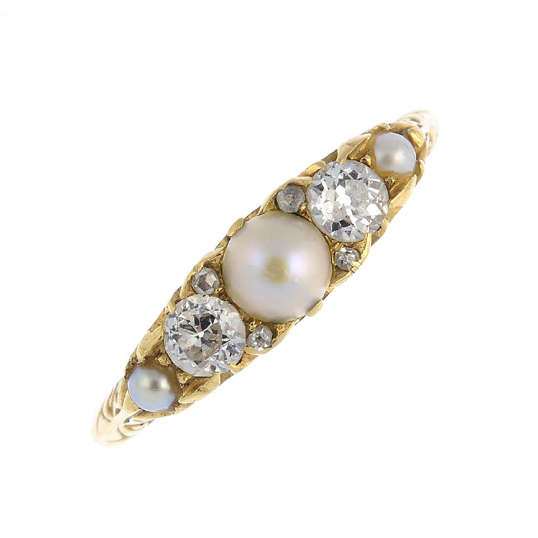 An early 20th century split pearl and diamond ring. The (1 of 3)