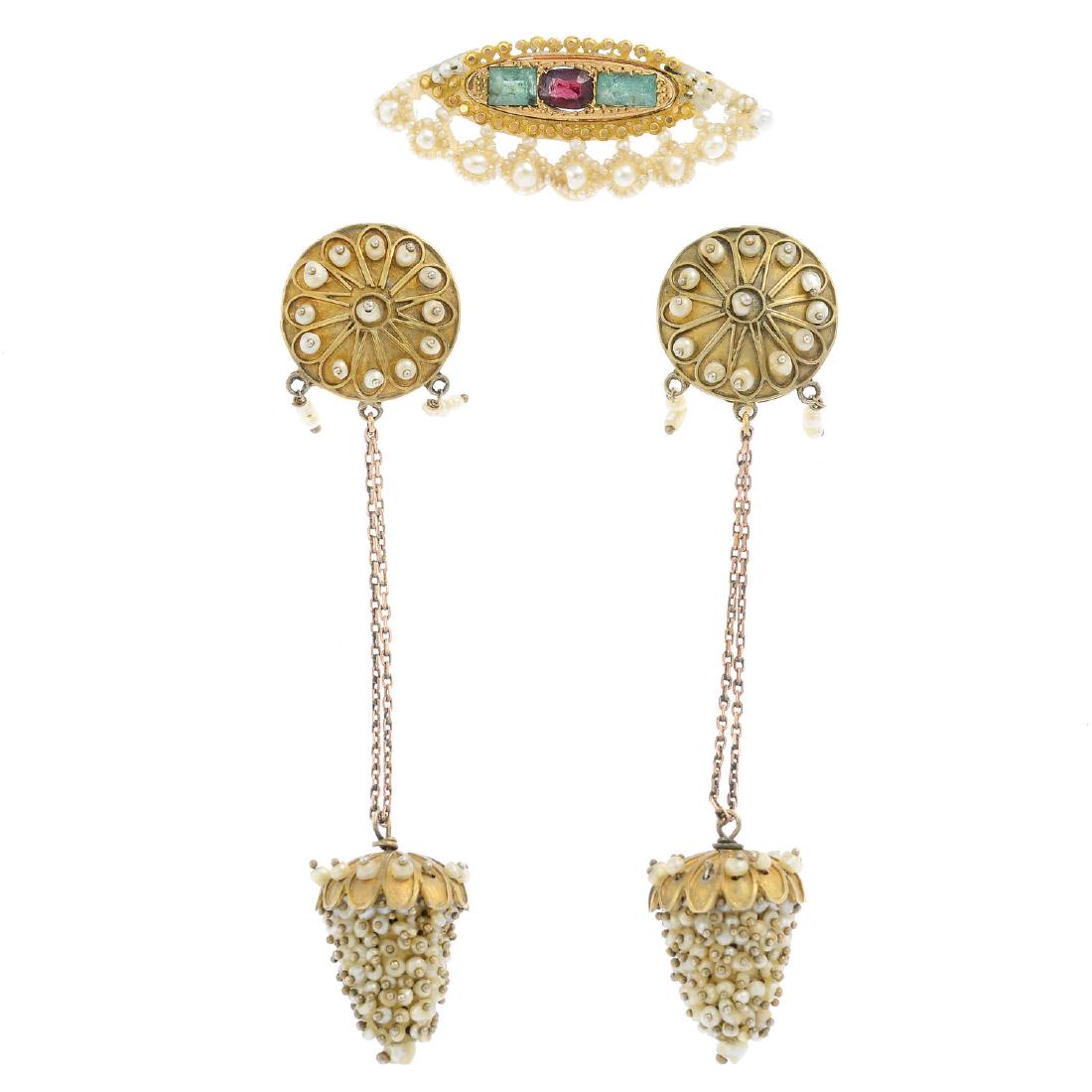 A pair of seed pearl earrings and a gem-set brooch. The: A pair of seed pearl earrings and a gem-set brooch. The earrings each designed as a seed pearl drop suspended from a similarly-set disc surmount, the brooch designed as a garnet and green beryl oval w