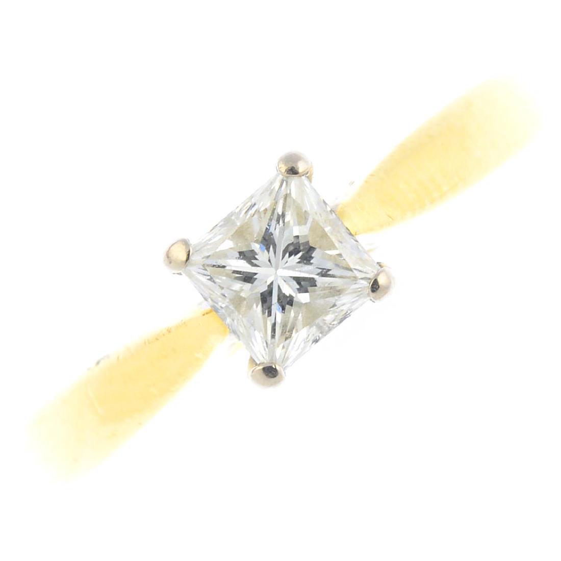 An 18ct gold diamond single-stone ring. The (1 of 3)
