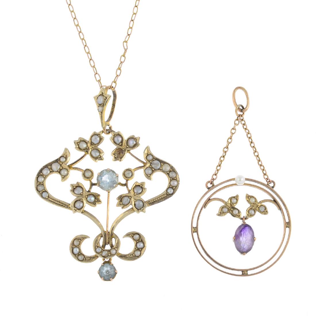 Two early 20th century gold gem-set pendants. The first (1 of 2)