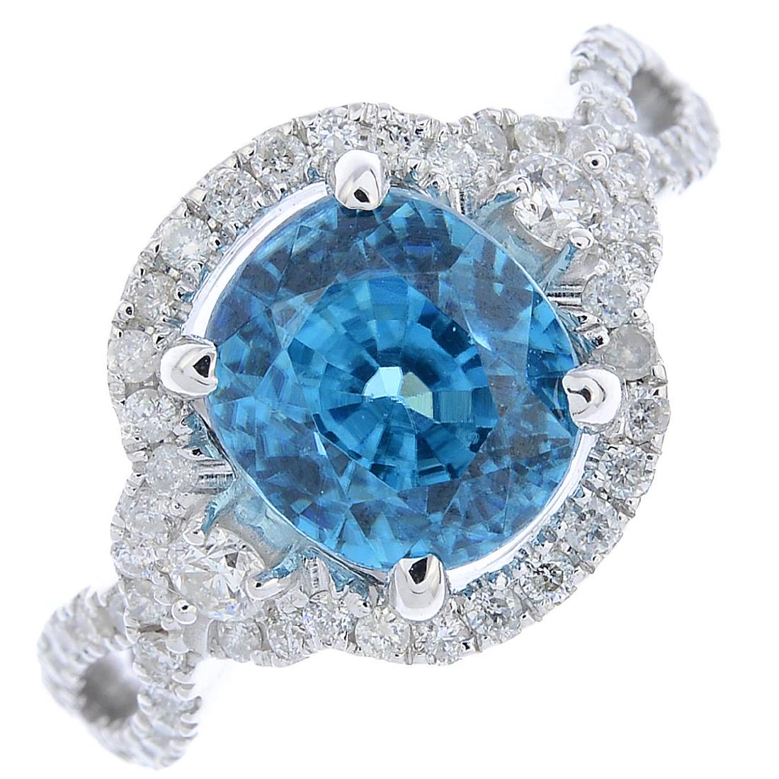 A zircon and diamond ring. The cushion-shape (1 of 3)