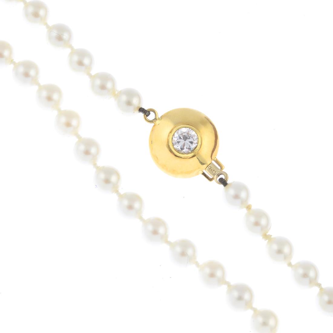 An 18ct gold cultured pearl necklace. Comprising a (1 of 2)