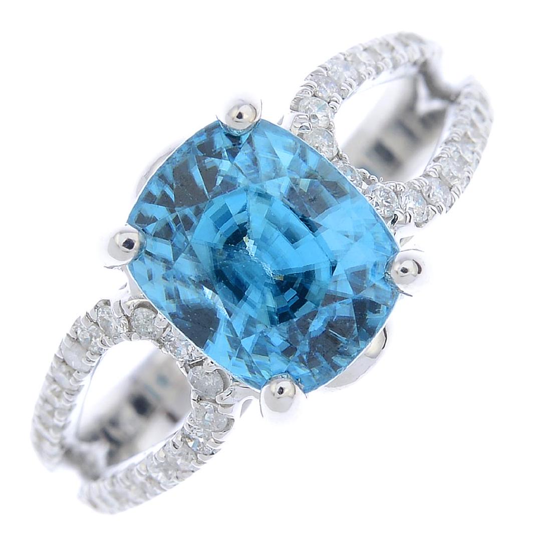 A zircon and diamond ring. The cushion-shape blue (1 of 3)