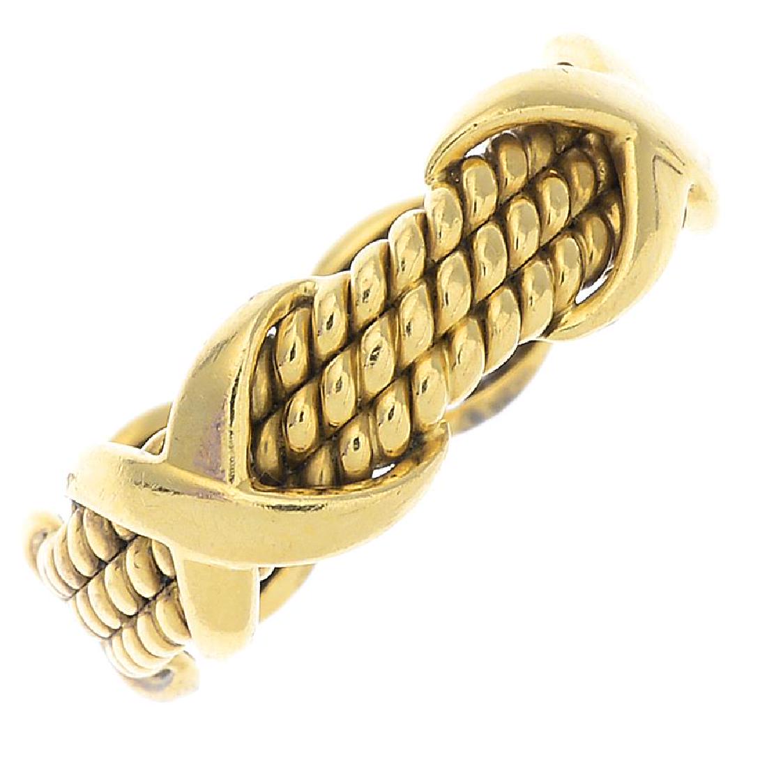 TIFFANY & CO. - a 'Rope Three-row X' ring. Designed as (1 of 3)