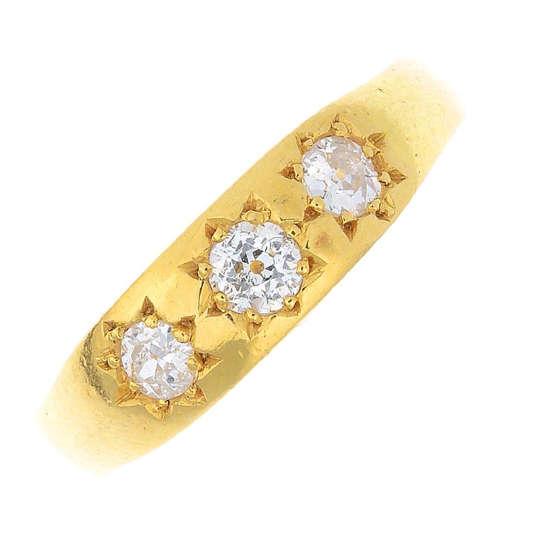 An early 20th century diamond three-stone ring. The (1 of 3)