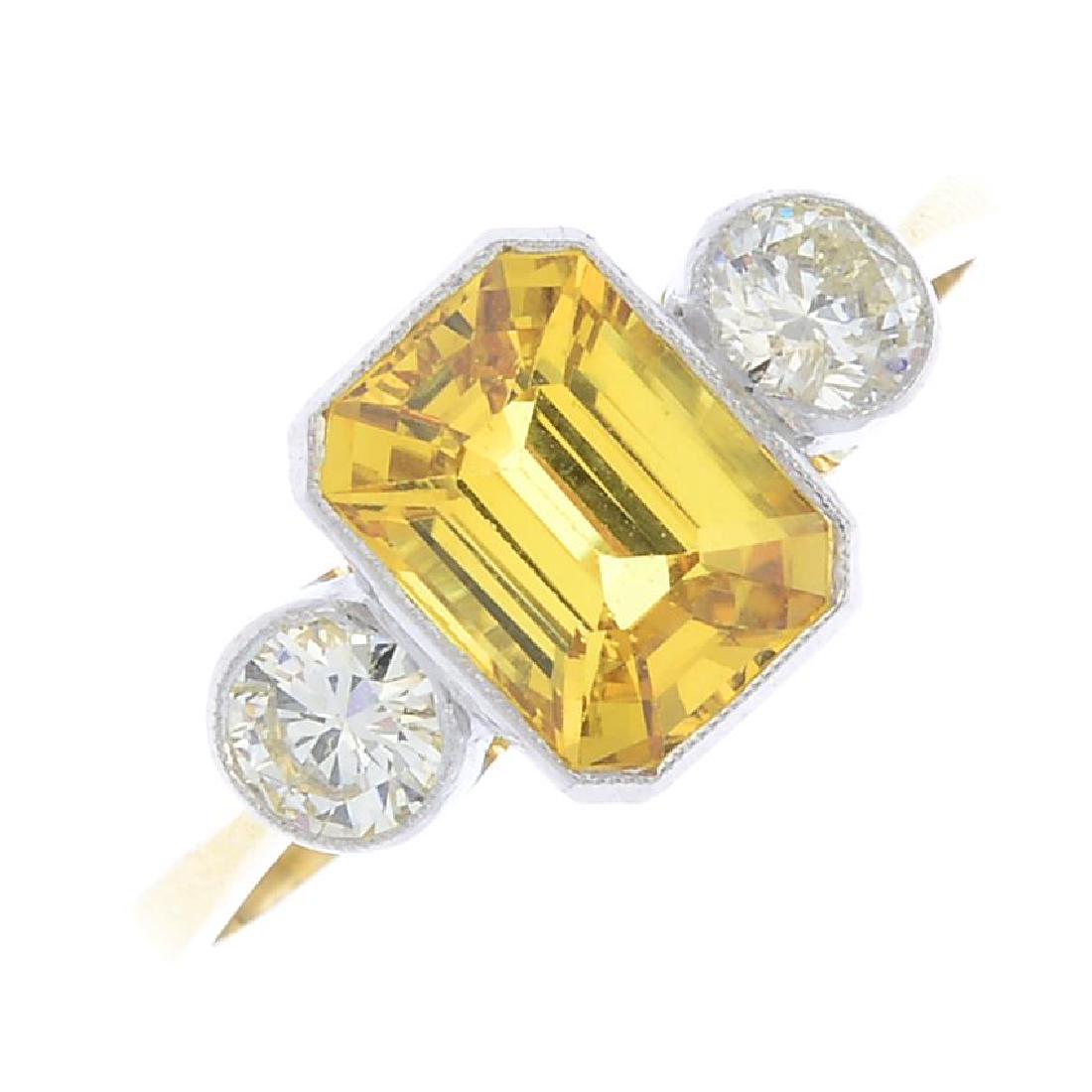 A sapphire and diamond three-stone ring. The (1 of 3)