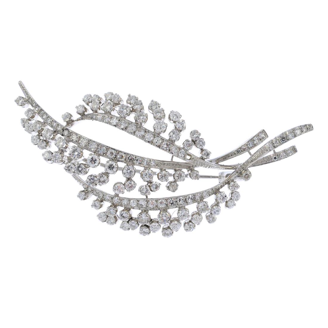 A diamond floral spray brooch. Designed as three single (1 of 2)