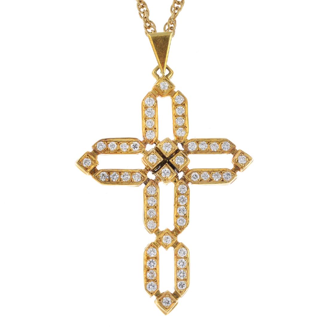A diamond cross pendant. Of openwork design, the (1 of 2)
