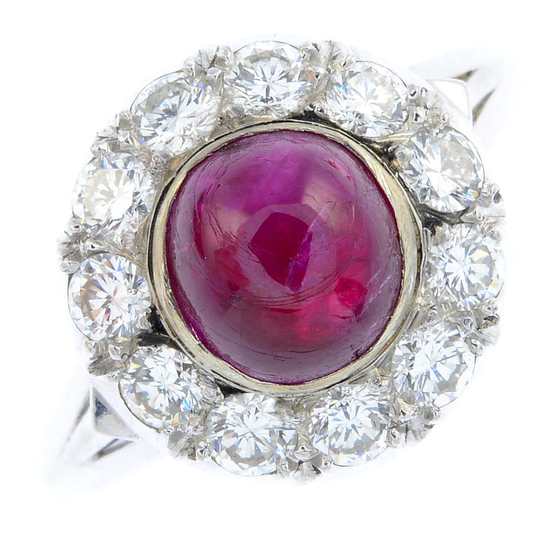 A platinum Burmese ruby and diamond cluster ring. The (1 of 4)