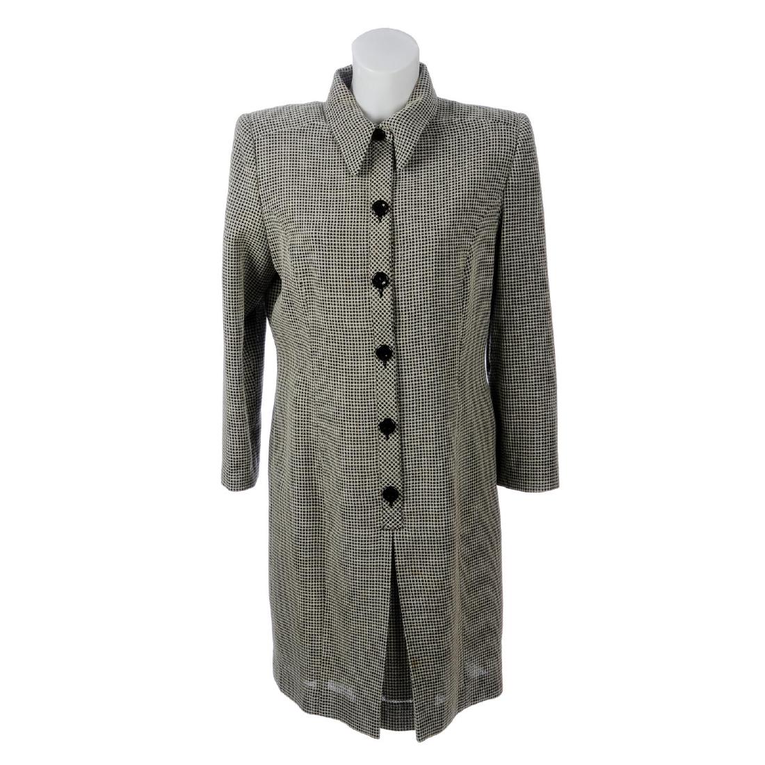 GIVENCHY - a selection of clothing. To include two: GIVENCHY - a selection of clothing. To include two dresses, a leopard patterned twinset and a striped T-shirt. Labelled Givenchy, sizes 40, 42 and L.