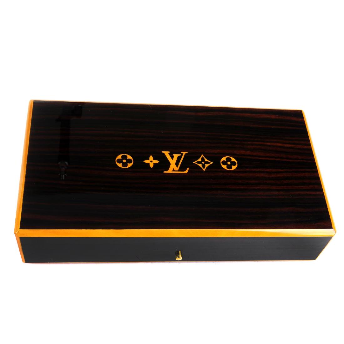LOUIS VUITTON a Cigar Humidor Case. With a polished Nov 19, 2018