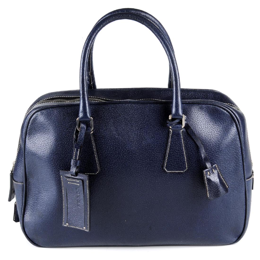 PRADA - a grained blue leather satchel. Featuring dual (1 of 4)