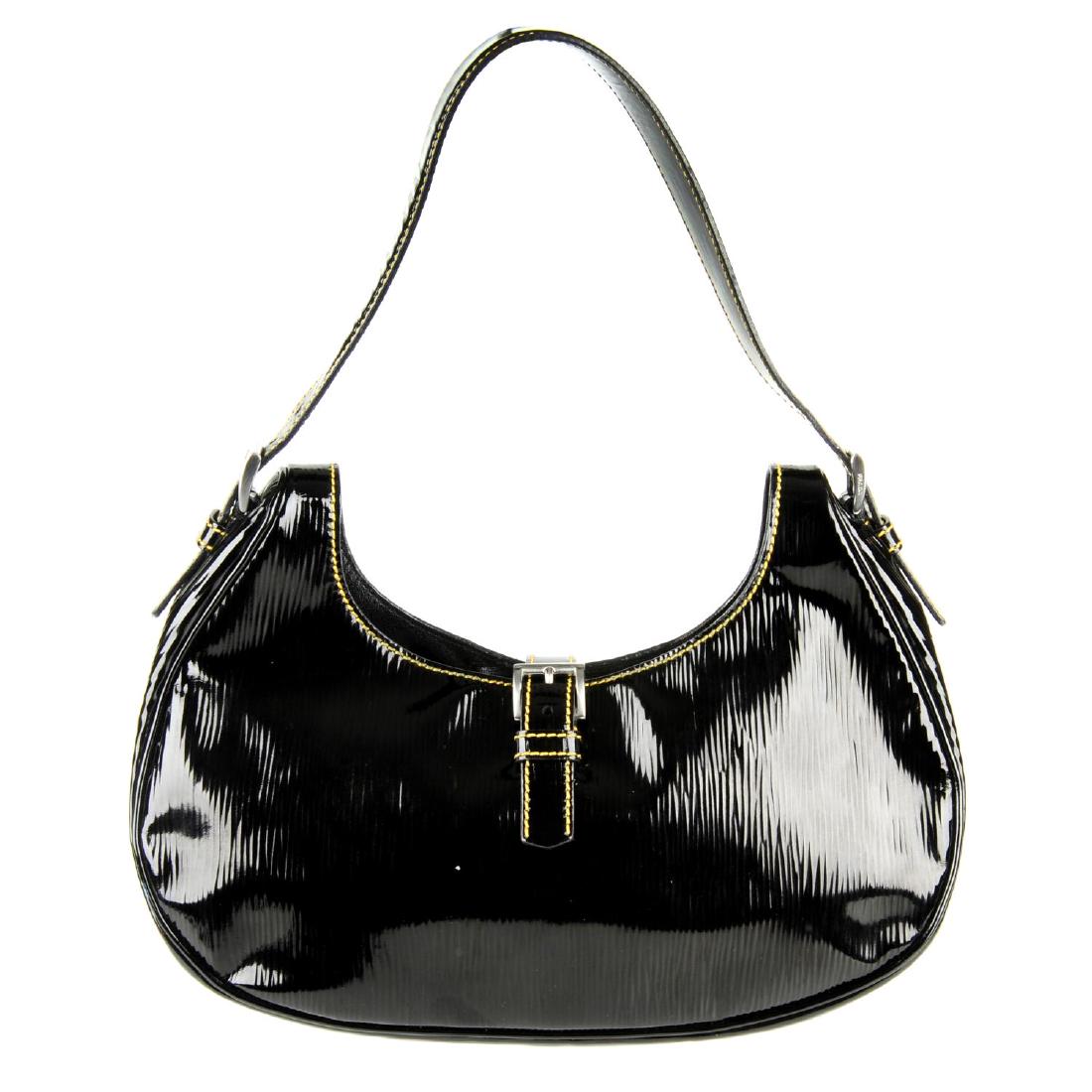 PRADA - a patent leather handbag. Designed with a black (1 of 5)