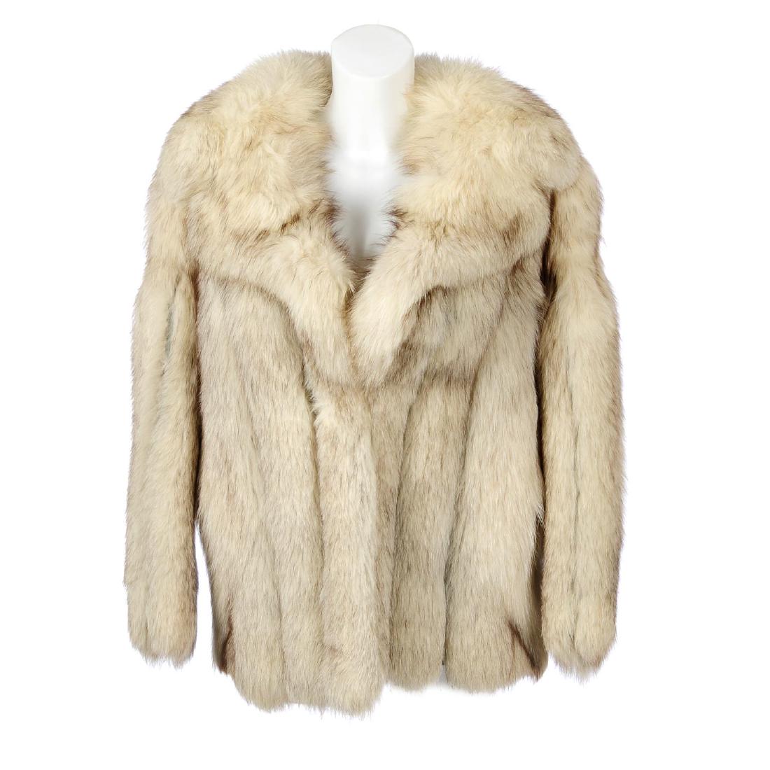 A blue fox fur jacket. Designed with a notched lapel (1 of 2)