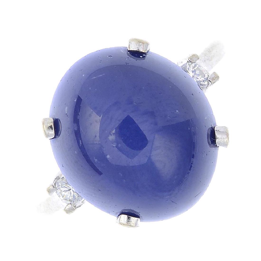 A star sapphire and diamond ring. The oval six-ray star (1 of 3)