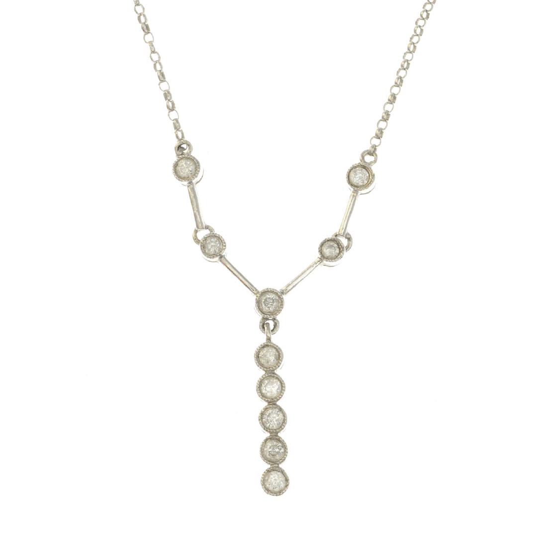 A 9ct gold diamond necklace. The brilliant-cut diamond (1 of 2)