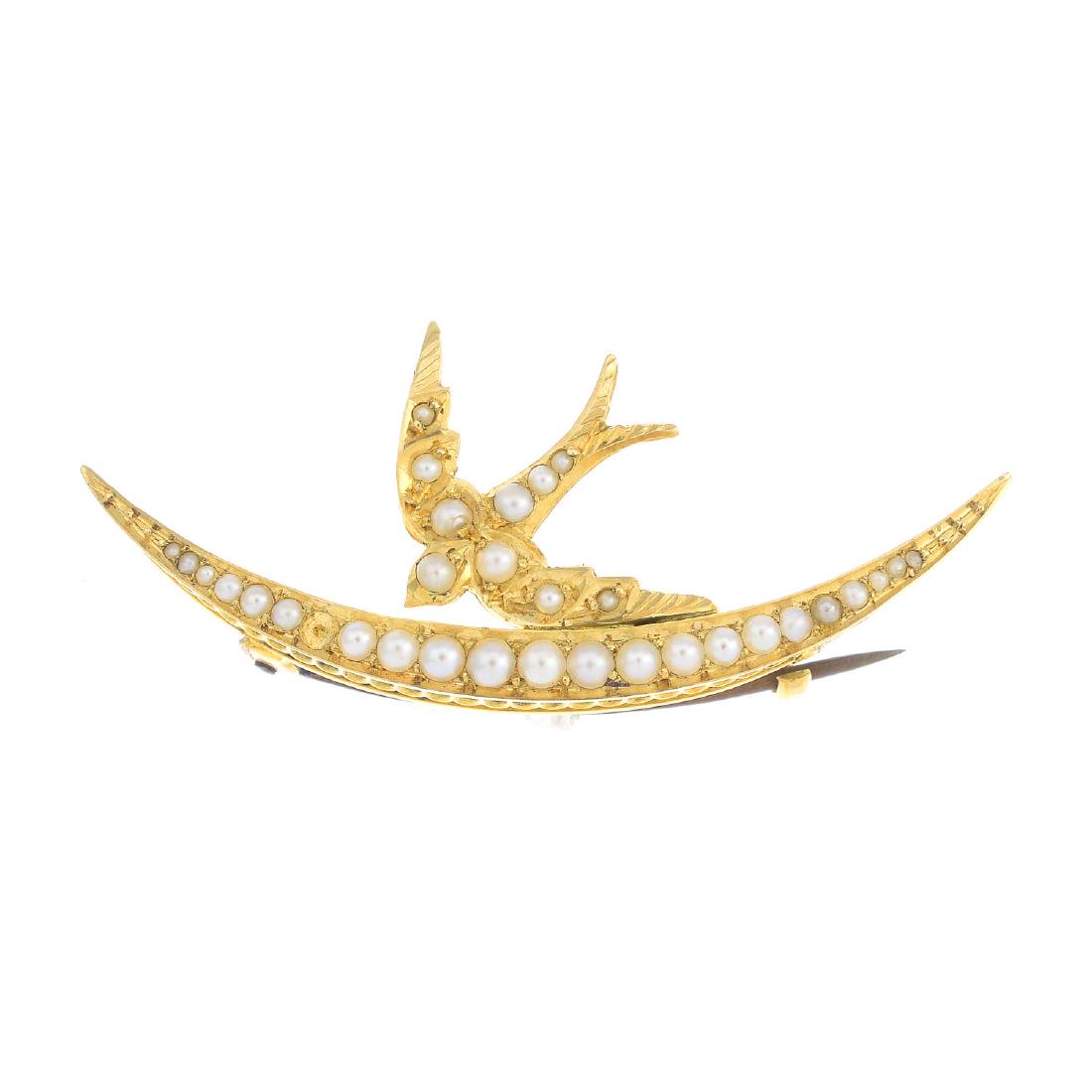 An early 20th century 15ct gold split pearl brooch. The (1 of 2)