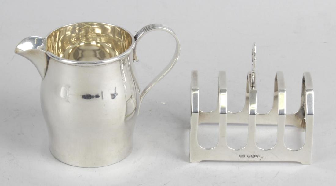 An Edwardian silver cream jug, of plain baluster form (1 of 1)