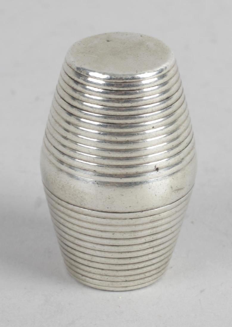 A George III silver nutmeg grater, the ribbed barrel (1 of 2)