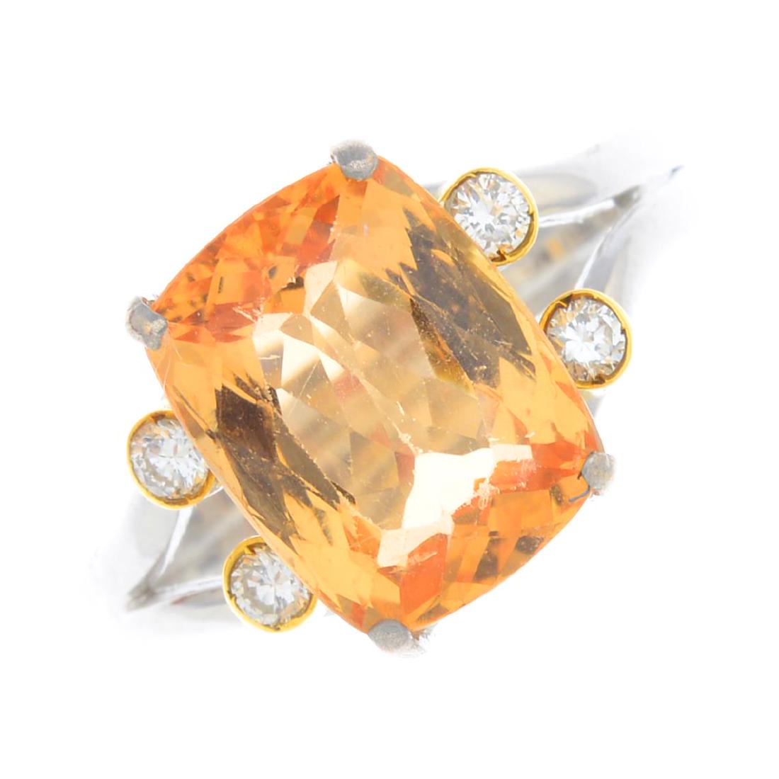 A topaz and diamond ring. The cushion-shape orange (1 of 3)