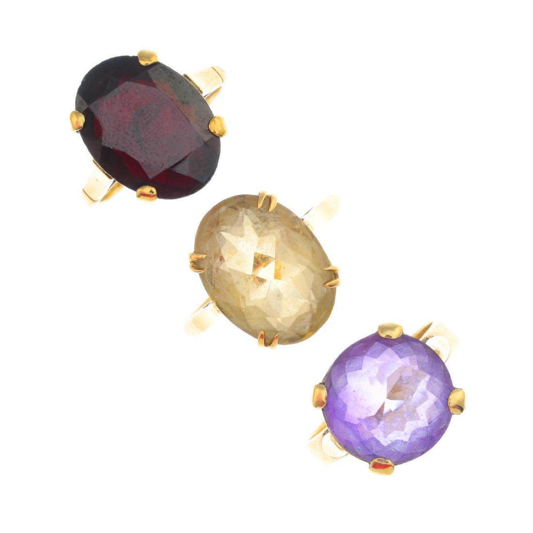 Six 9ct gold gem-set rings. To include three amethyst, (1 of 3)