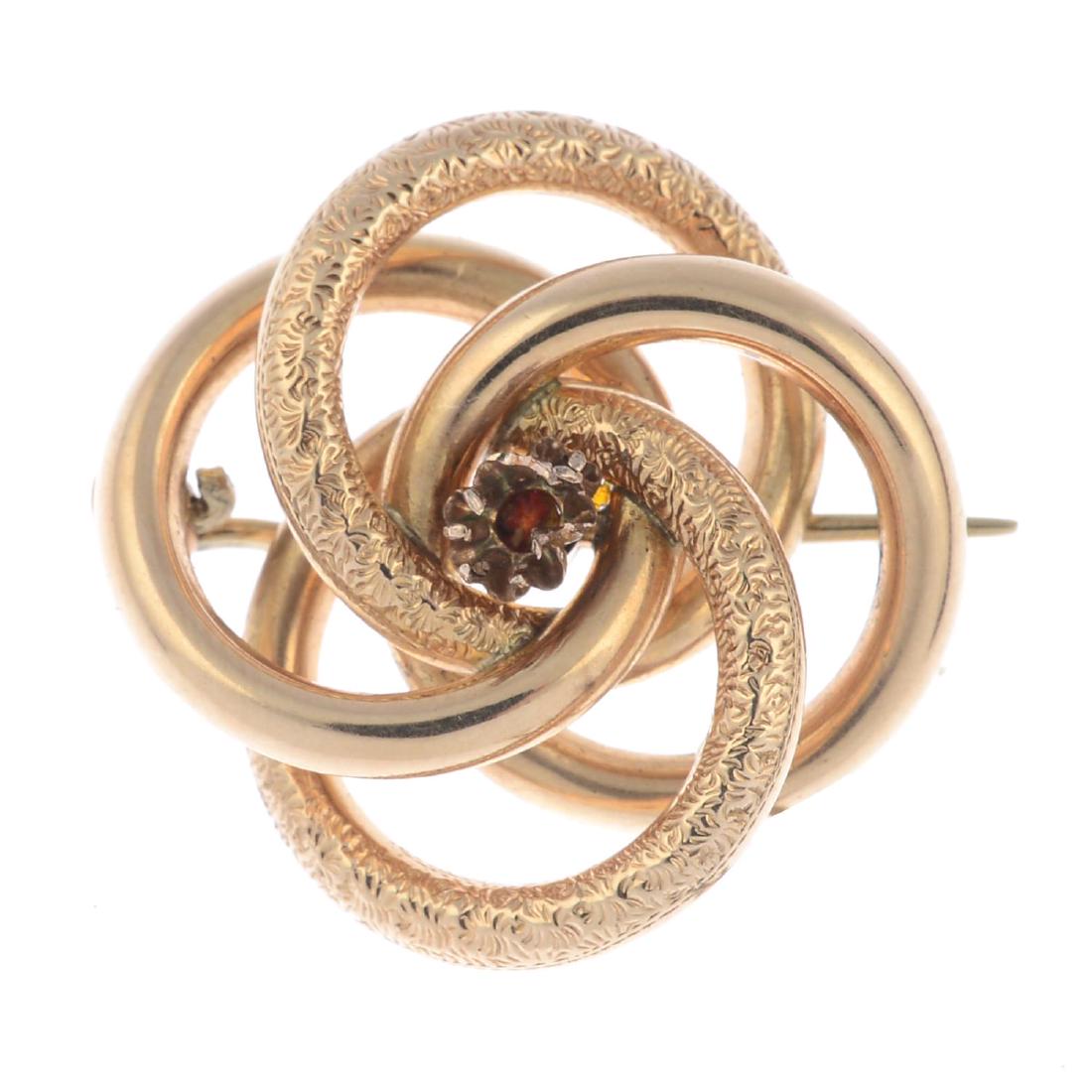 A late Victorian gold brooch. Designed as a series of (1 of 2)