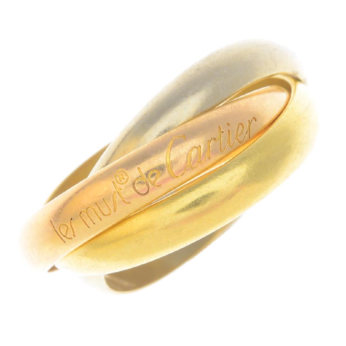 CARTIER - a 'Trinity' ring. Comprising three tri-colour (1 of 3)