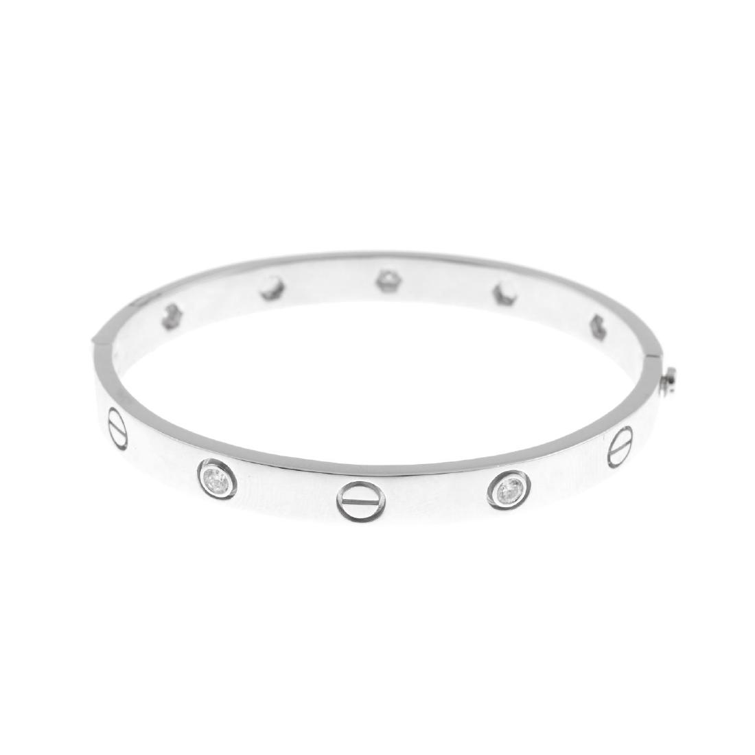 A diamond hinged bangle. Designed as an alternating (1 of 2)