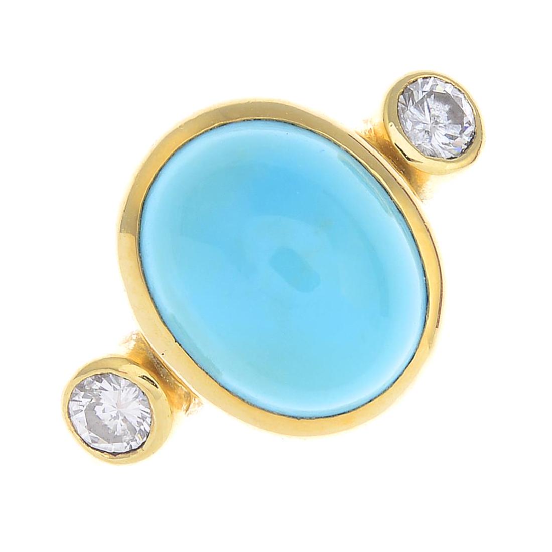 An 18ct gold turquoise and diamond three-stone ring. (1 of 3)