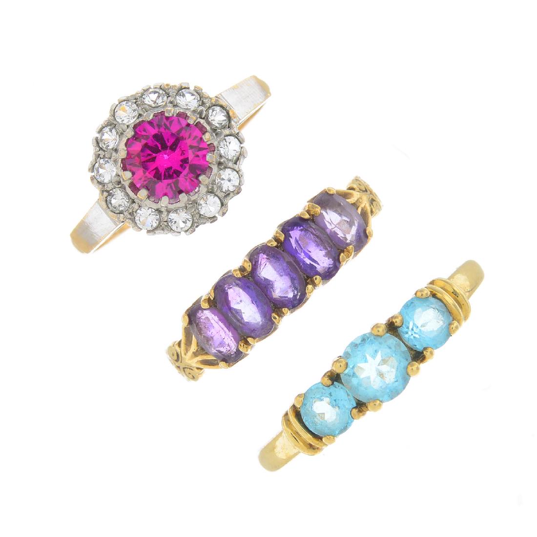 Three 9ct gold gem-set rings. To include a 1970's (1 of 3)